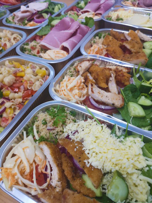 Deli foods in trays